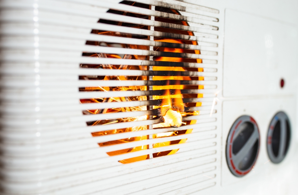 Air conditioner on fire as an example of a product liability case.