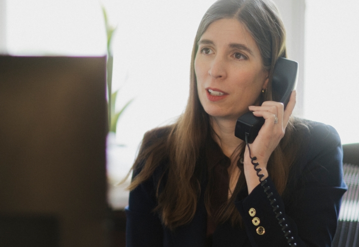 lawyer on the phone talking with a client