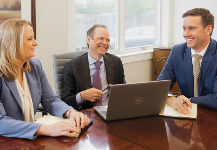 Roman & Boock attorneys discussing their personal injury claims process.