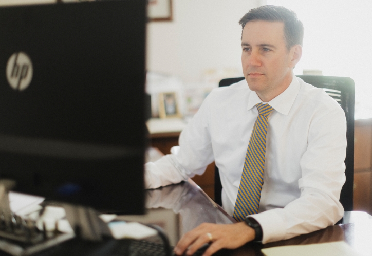 Attorney looking at a computer.